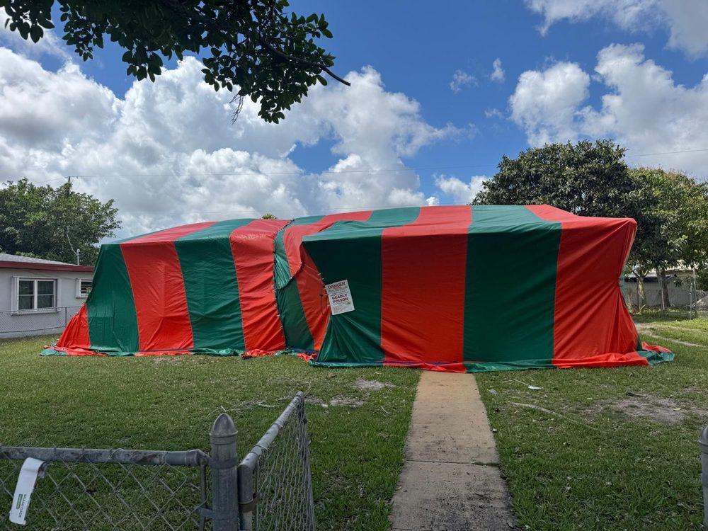 House tented on the lawn